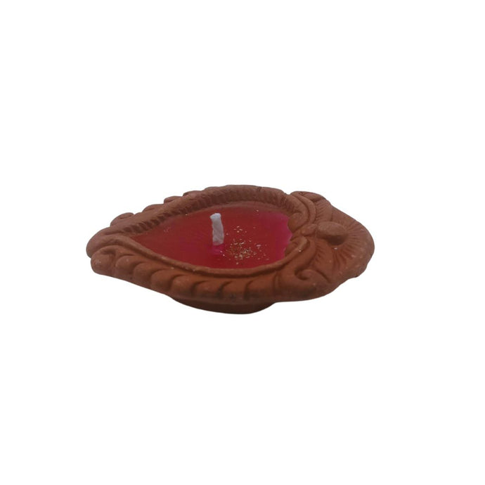 Red Candle On Terracotta Diya